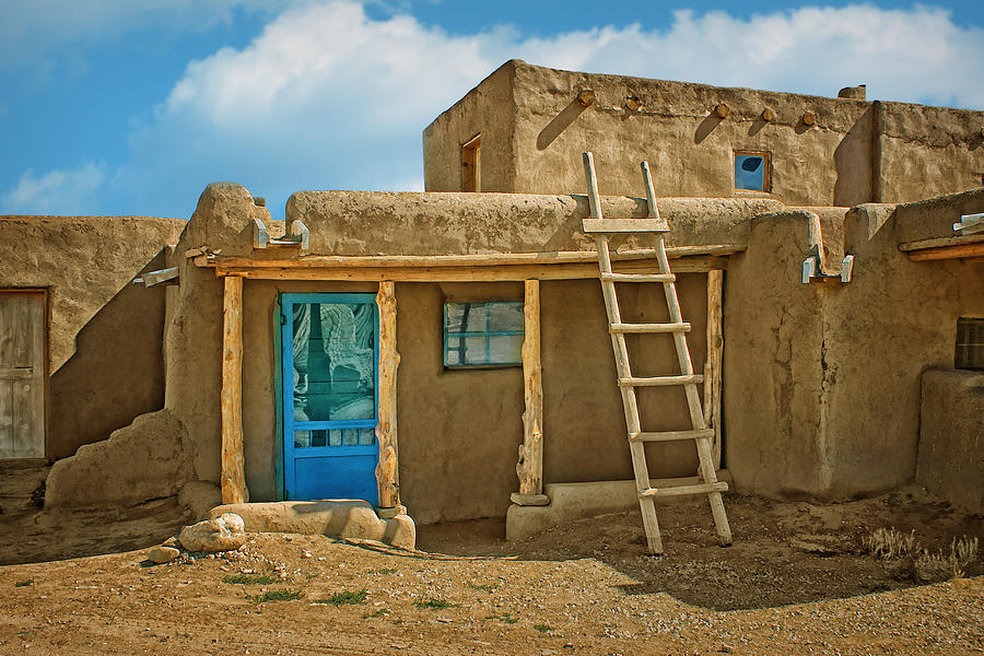 Architecture Photograph - Blue Door and Ladder - Taos Pueblo by Nikolyn McDonald