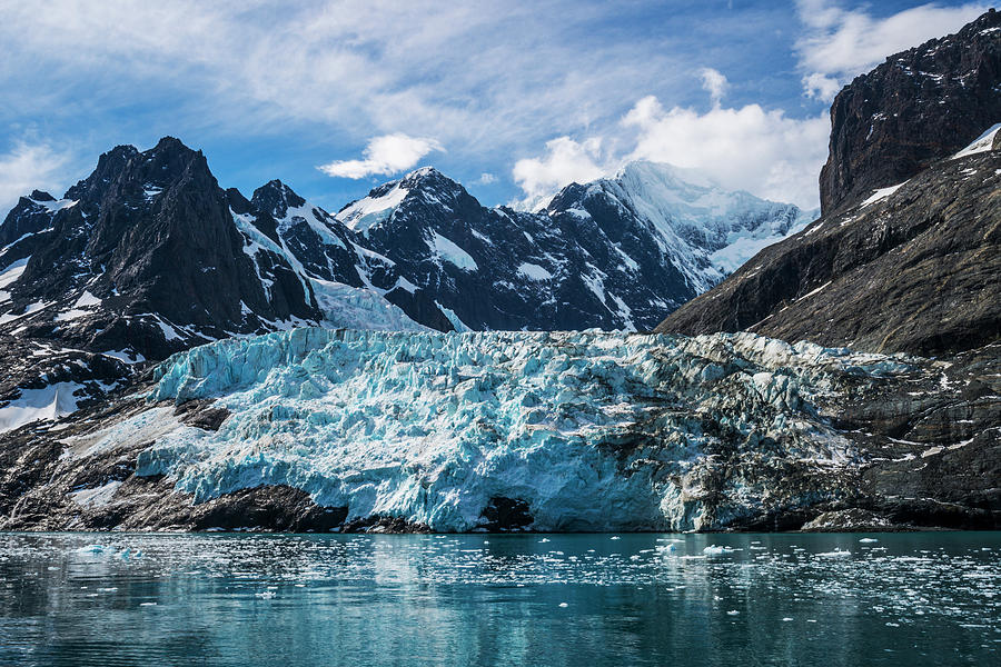 Blue Glacier Between Snow-capped Photograph by Nick Dale