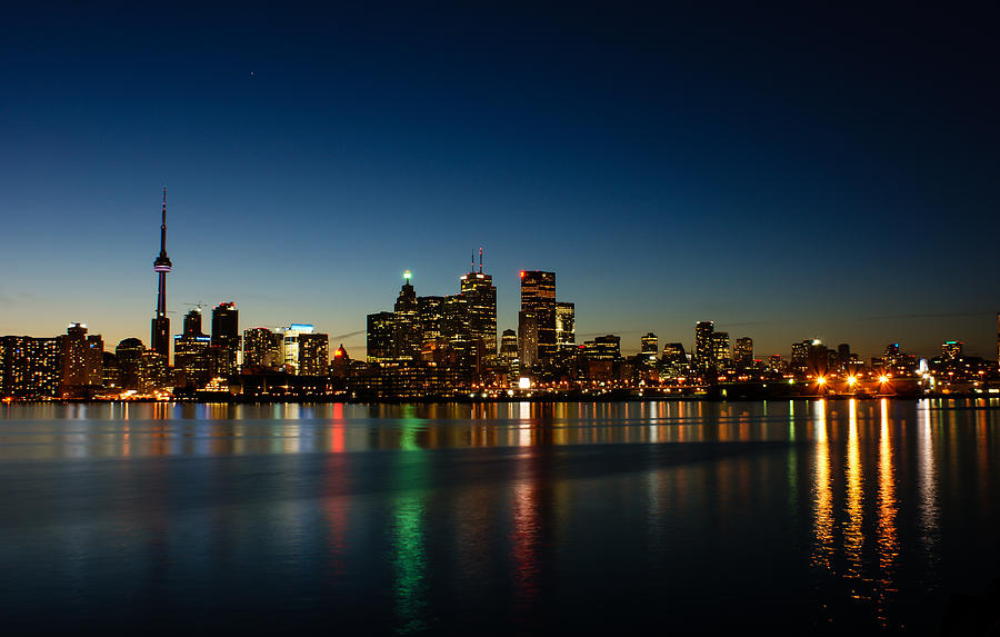 Blue Hour - Torontos Dazzling Skyline Reflecting in Lake Ontario Photograph by Georgia Mizuleva