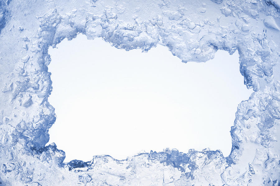 Blue ice framing blank pale blue background Photograph by Grafissimo