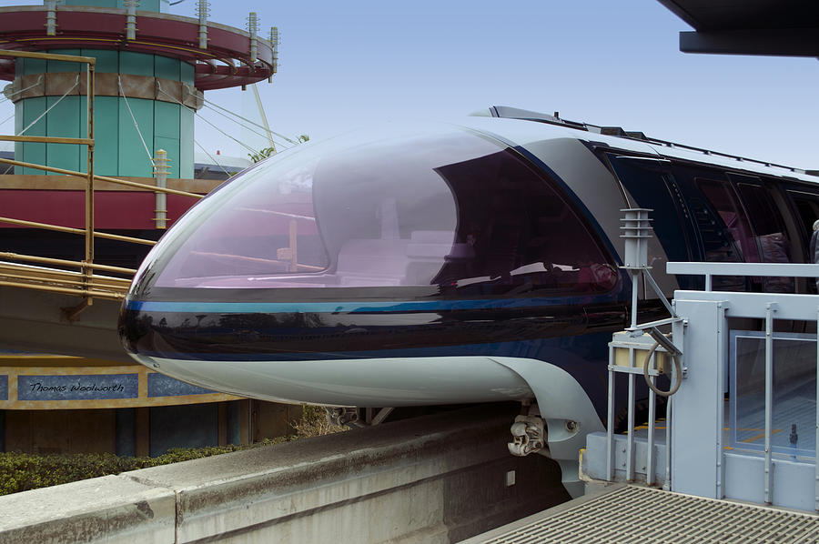 Blue Monorail In The Station Disneyland 02 Photograph by Thomas Woolworth