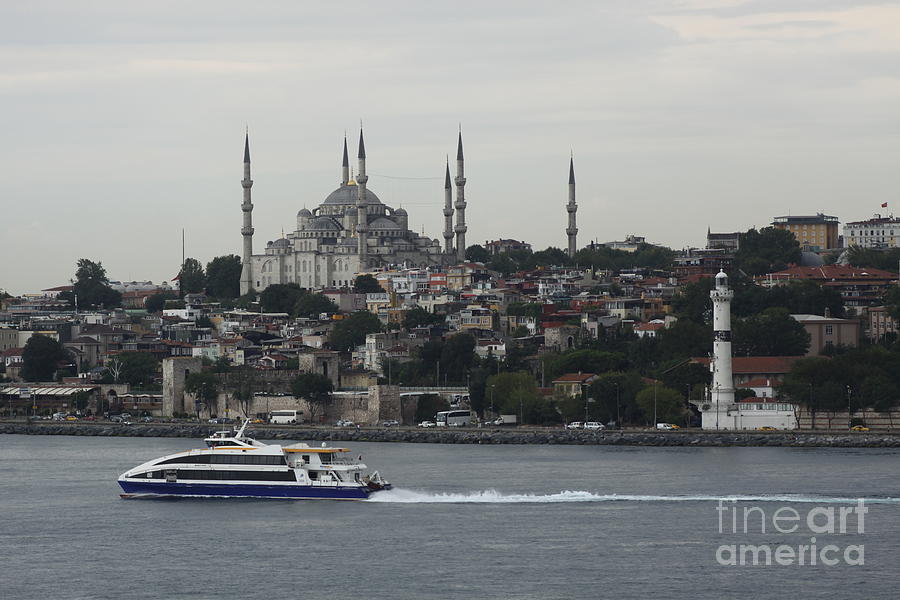 Blue Mosque and Lighthouse Photograph by Christiane Schulze Art And Photography