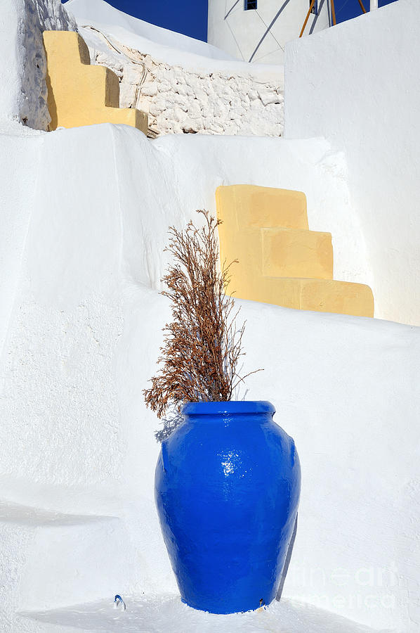 Blue pot in Oia town Photograph by George Atsametakis