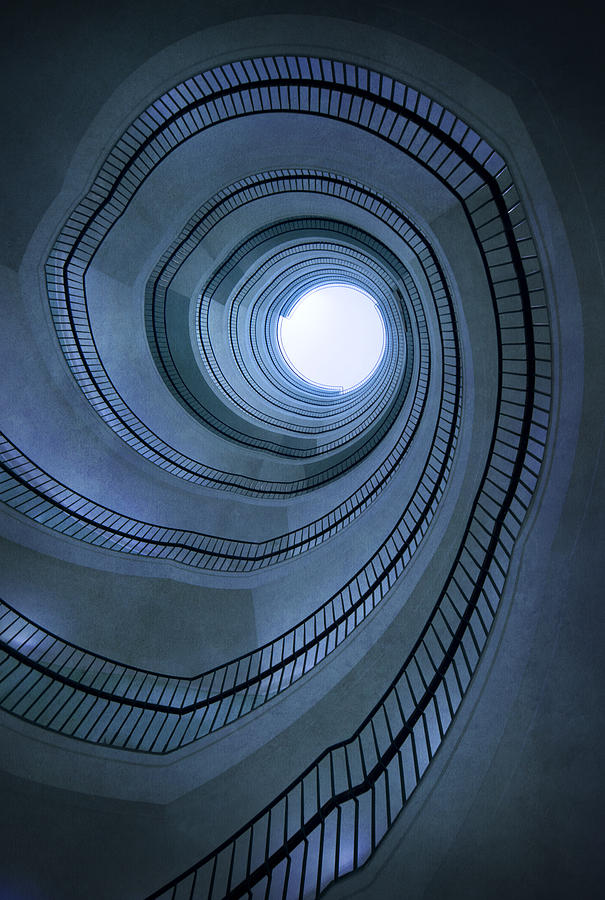 Blue spiral staircaise Photograph by Jaroslaw Blaminsky