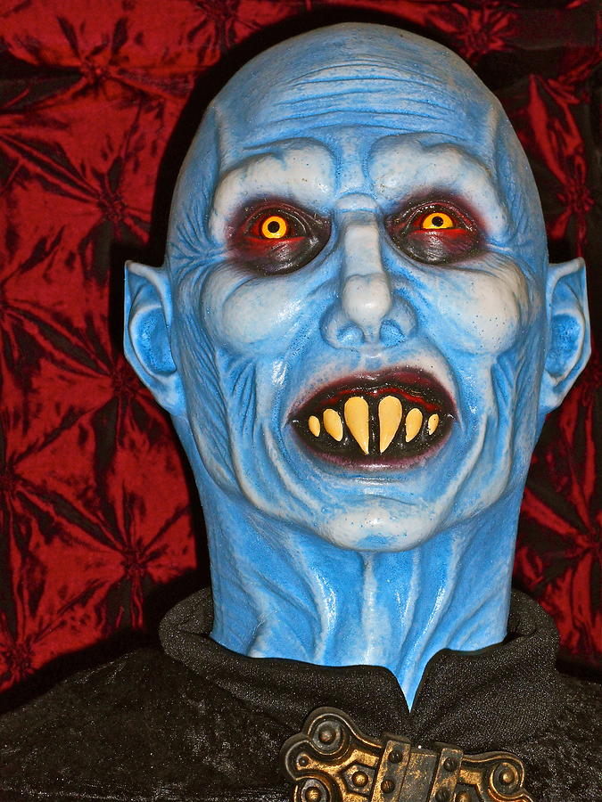 Blue vampire Photograph by Joan Reese