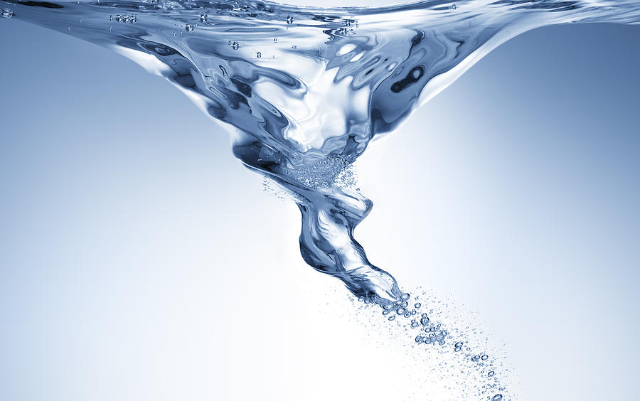 Blue vortex in water Photograph by Studio 504