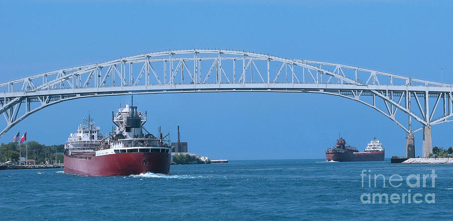 Blue Water Bridge and Freighters Photograph by Ann Horn