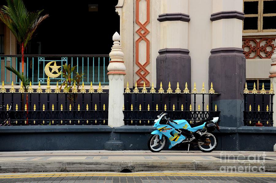 Sports Photograph - Blue yellow sporty motorcycle parked on pavement by Imran Ahmed
