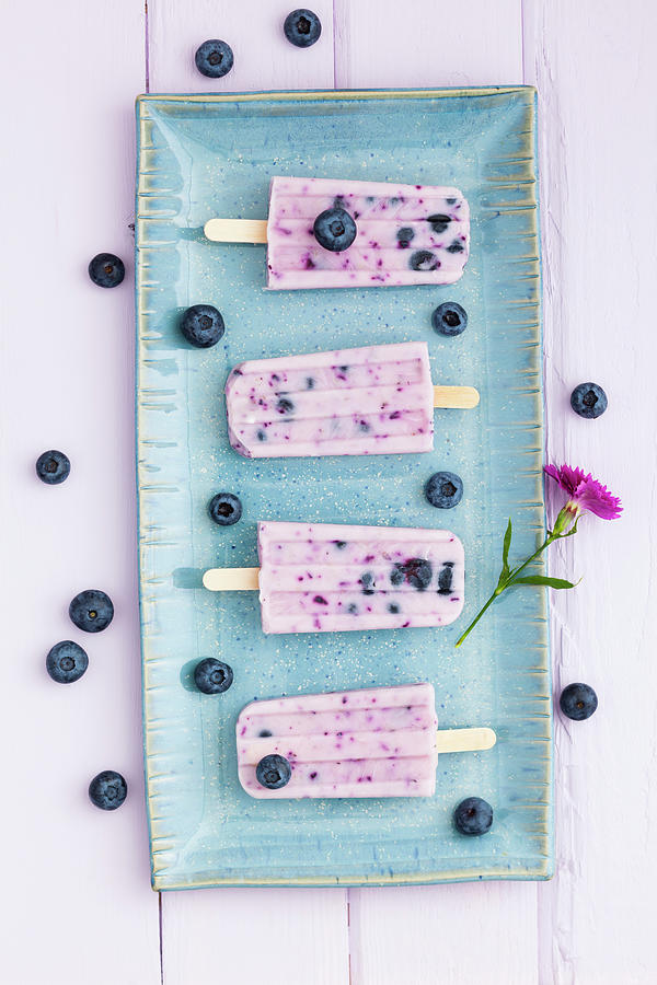 Blueberry Yogurt With Candy On Tray Photograph by Westend61