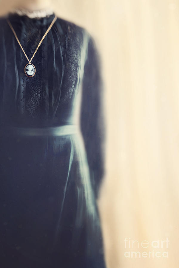 Misery Movie Photograph - Blurred image of a black mourning dress with cameo by Sandra Cunningham