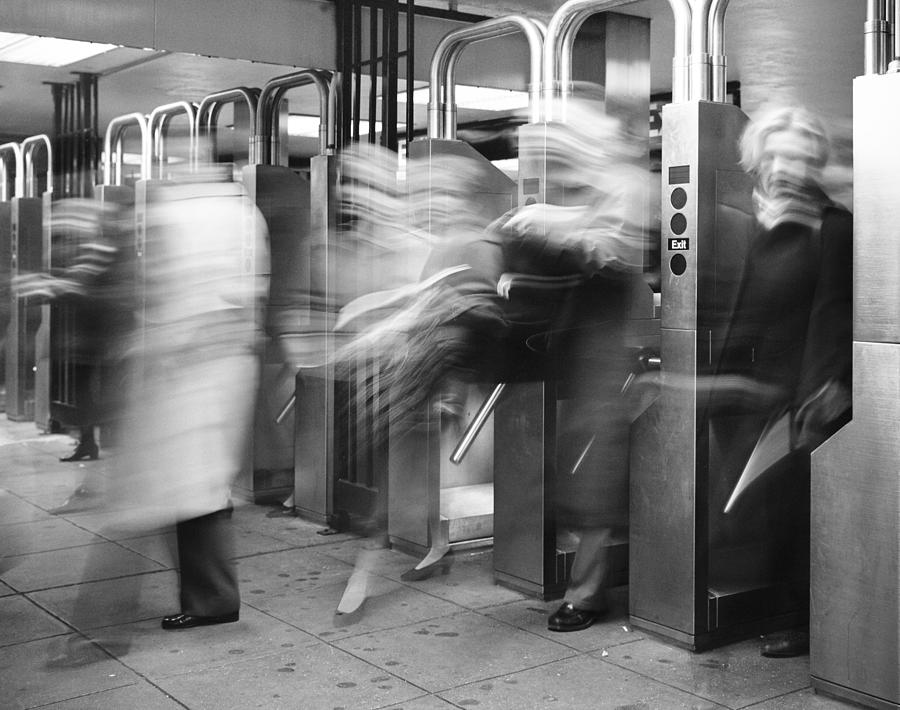 Black And White Photograph - Blurred in Turnstile by Dave Beckerman