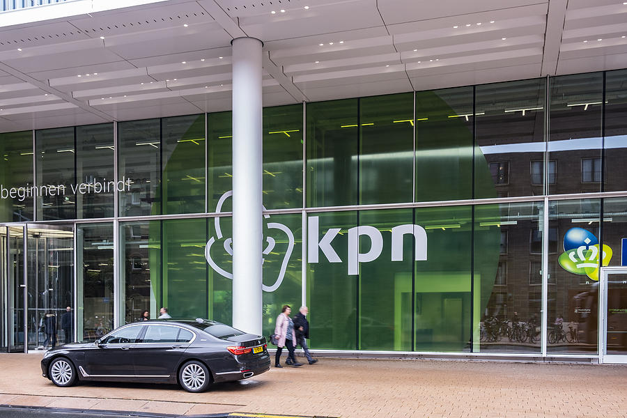 BMW 7-series luxury executive limousine parked in front of the KPN office in Rotterdam Photograph by Sjo