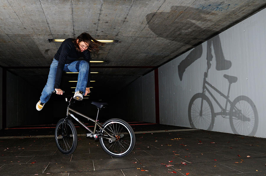 Sports Photograph - BMX Flatland Monika Hinz doing awesome trick with her bike by Matthias Hauser
