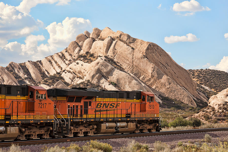 BNSF past Mormon Rocks Photograph by Peter Tellone