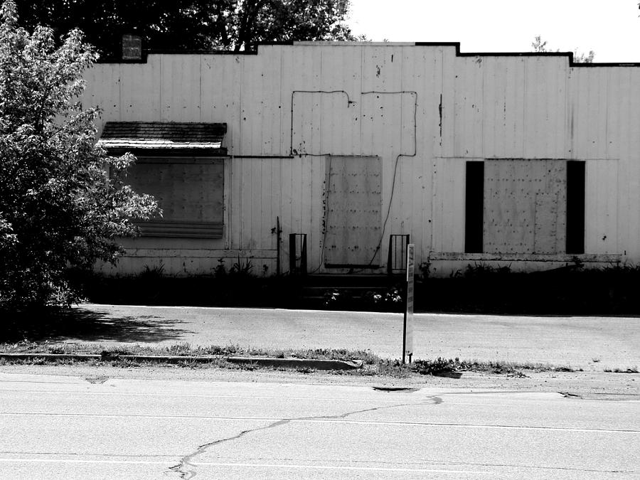 Boarded Up - Black and White Photograph by Corinne Elizabeth Cowherd