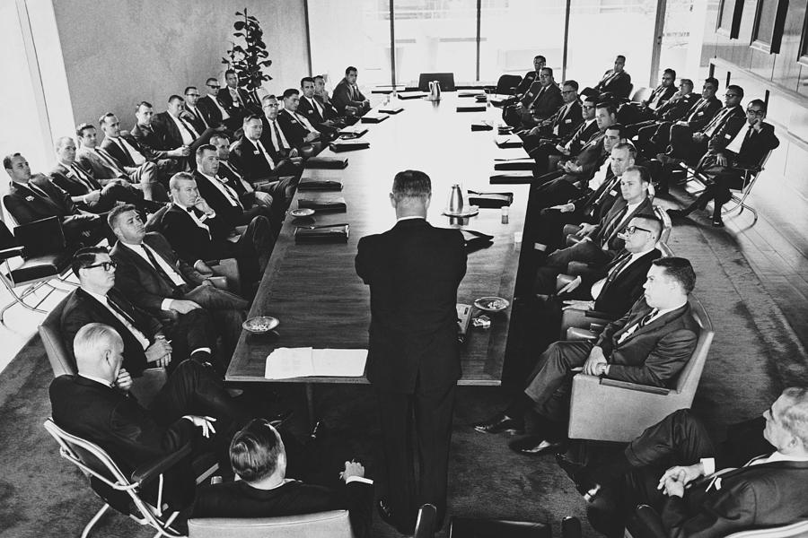 1950s Photograph - Boardroom Meeting, C. 1960s by M.e. Warren