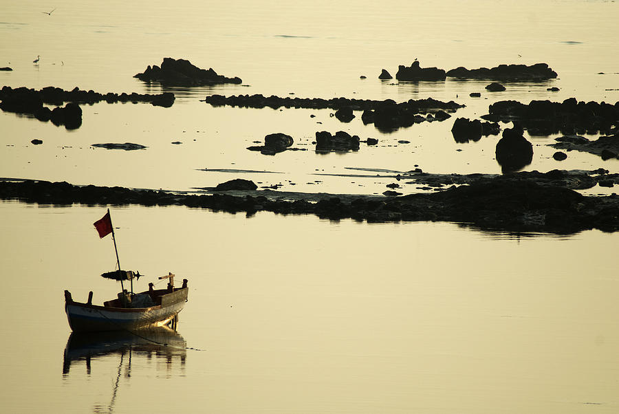 Boat Amongst The Rocks Photograph by Rajiv Chopra
