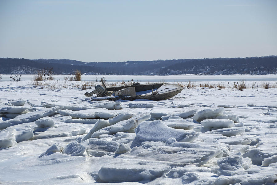 Boat and ice Hobart Beach NY Photograph by Susan Jensen