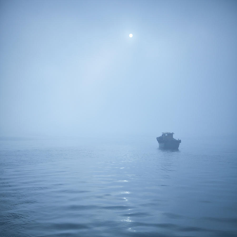 Boat In Misty Waters Photograph by Copyright Yug and her