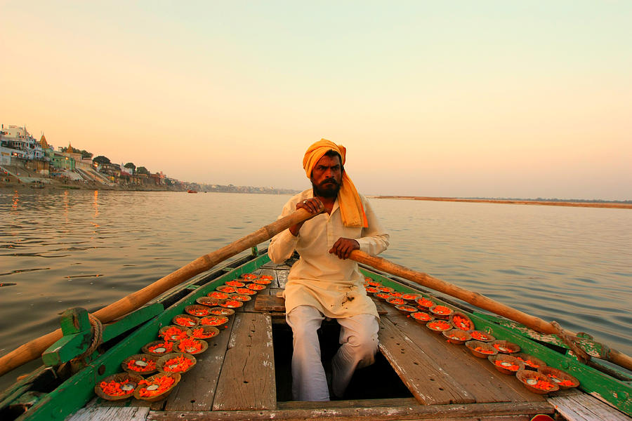 Boat Man on the Ganges River at Varanasi Photograph by Amanda Stadther