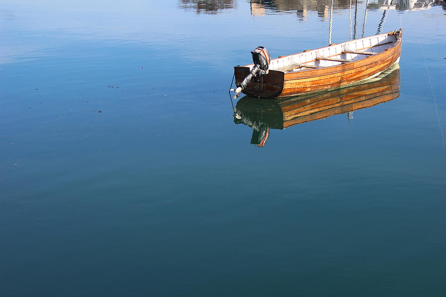 Boat on calm water 2 Photograph by Toni and Rene Maggio