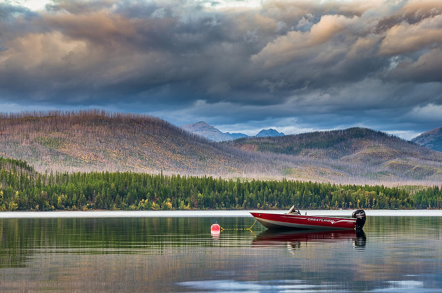 Boat on Lake McDonald Photograph by Greg Nyquist