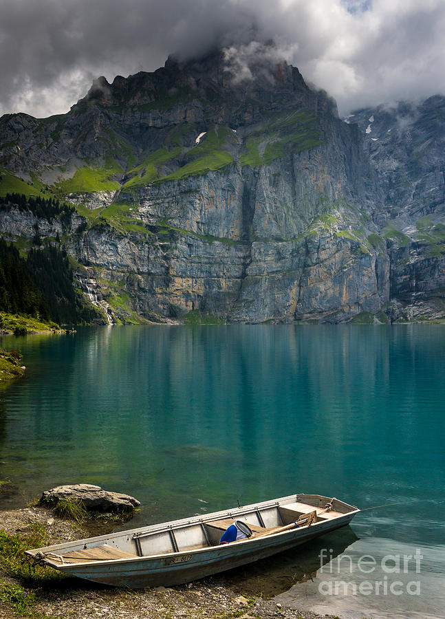 Boat on the Oeschinensee - Swiss Alps  Photograph by Gary Whitton