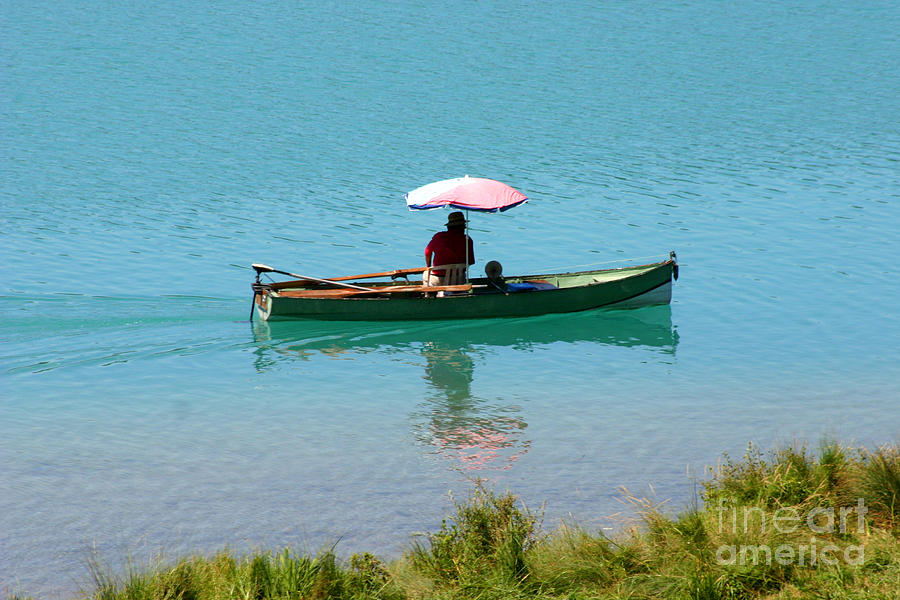 Boat With Umbrella Photograph by Holly C. Freeman