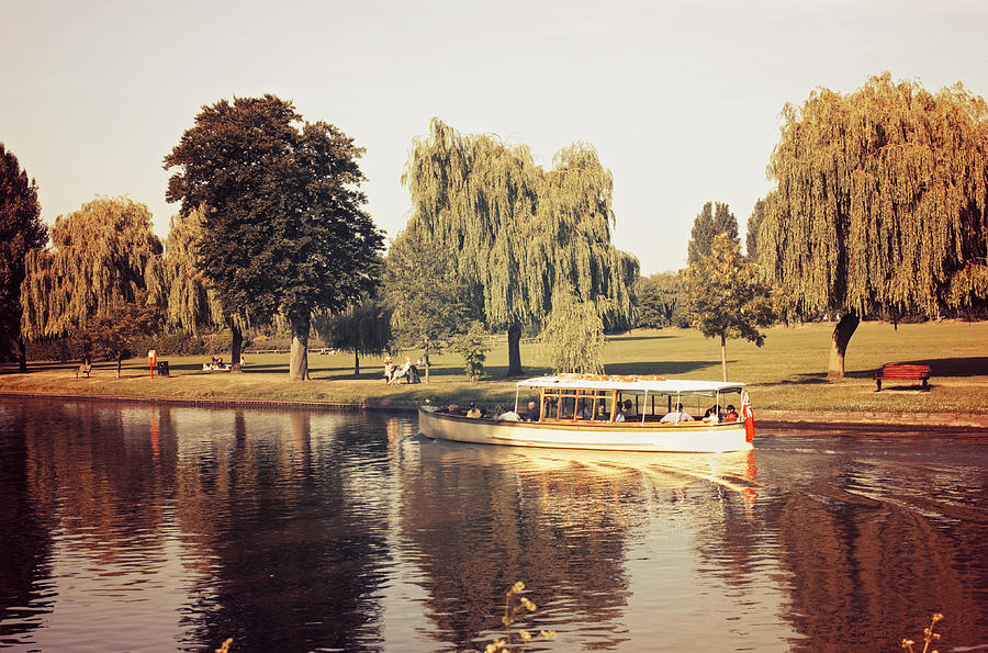 Tree Photograph - Boating on the river by Kevin Round