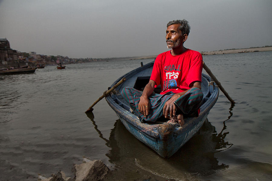 Boatman on the Ganges River Photograph by Louis Kleynhans - Fine Art ...