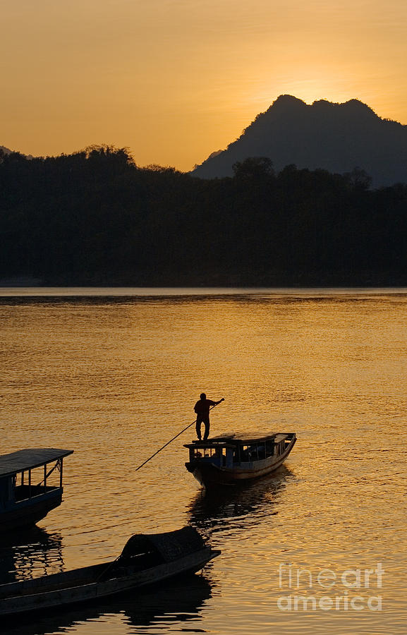 Boatman on the Mekong Laos Photograph by Craig Lovell