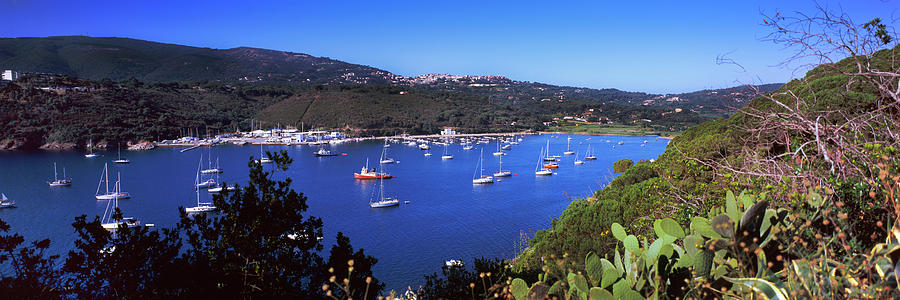 Nature Photograph - Boats At A Harbor, Porto Azzurro by Panoramic Images