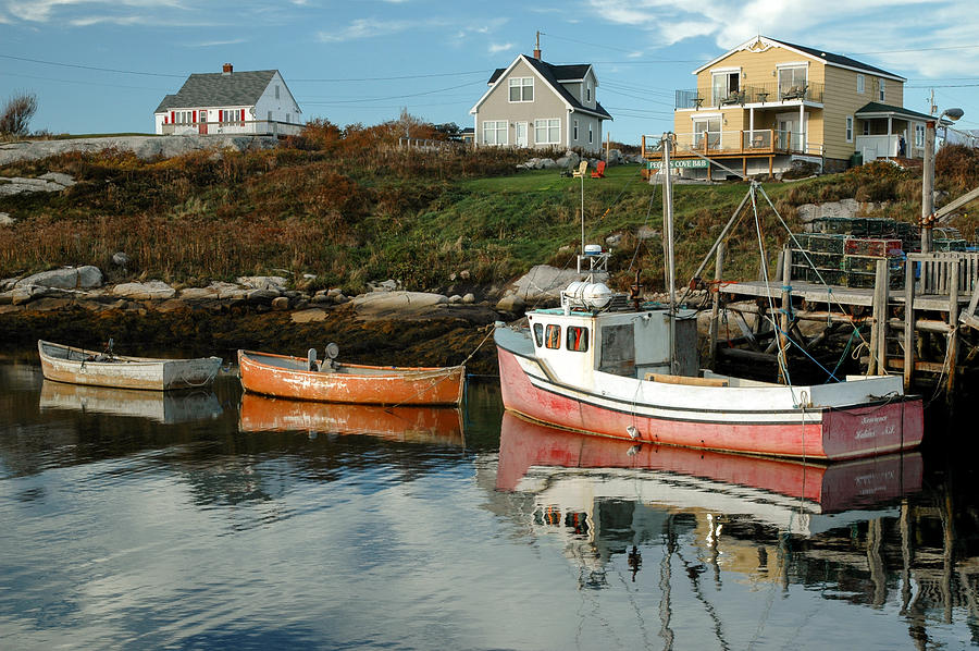 Boats at a small wharf. Peggys Cove. Photograph by Rob Huntley