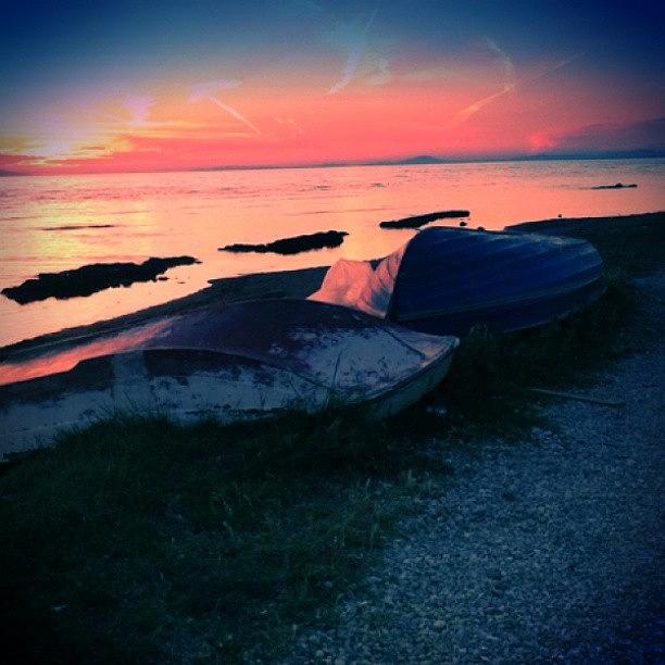 Summer Photograph - Boats At Sunset by Emanuela Carratoni