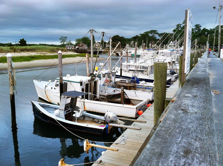 Boats Docked at Rock Harbor Photograph by Kate Scott