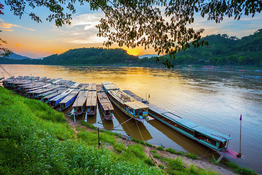 Boats In Mekong River In Luang Prabang Photograph by Gonzalo Azumendi