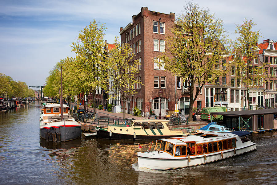 Boats on Amsterdam Canal Photograph by Artur Bogacki
