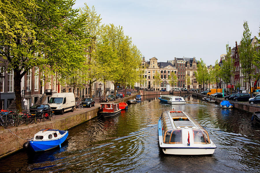 Boats on Canal Tour in Amsterdam Photograph by Artur Bogacki