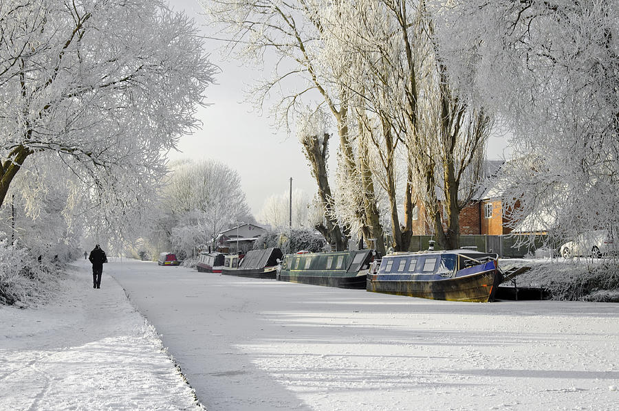 Boats on the Frozen Burton Canal Photograph by Rod Johnson