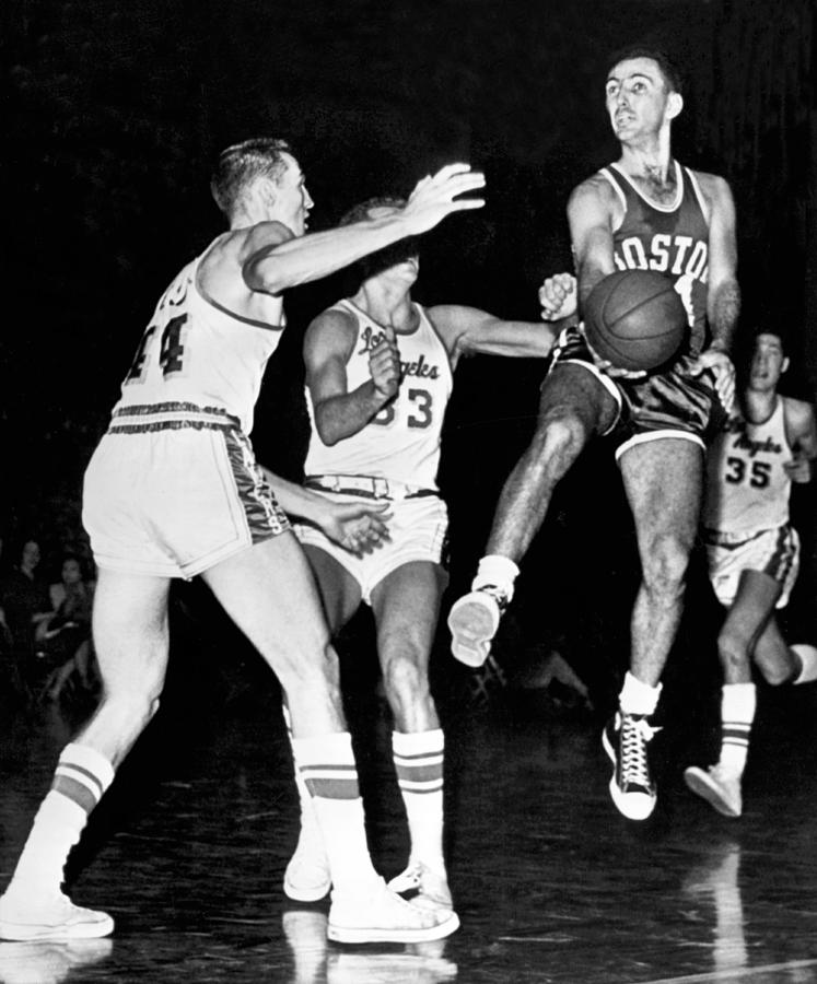 Bob Cousy Passes Basketball Photograph by Underwood Archives