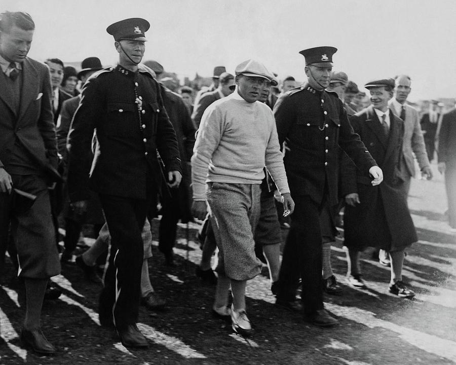 Bobby Jones Walking Being Escorted By Police Photograph by Artist Unknown