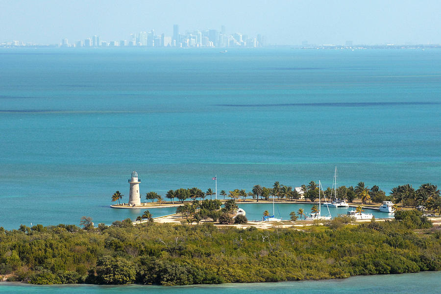 Boca Chita Lighthouse and Miami Skyline Photograph by Georgia Clare