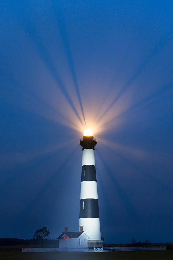 Bodie Island Lighthouse at night Photograph by Kevin Adams