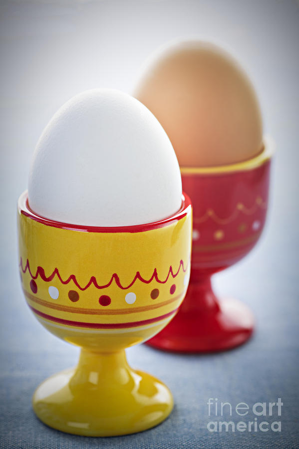 Egg Photograph - Boiled eggs in cups by Elena Elisseeva