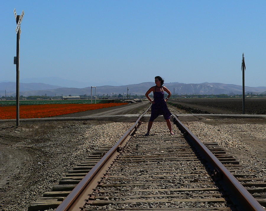 Bold Woman Railroad Tracks Photograph by Jeff Lowe