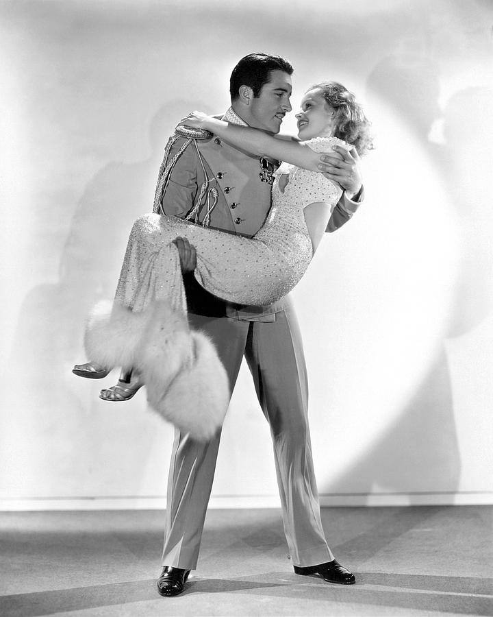 Hollywood Photograph - Boles Carries Harvey by Underwood Archives