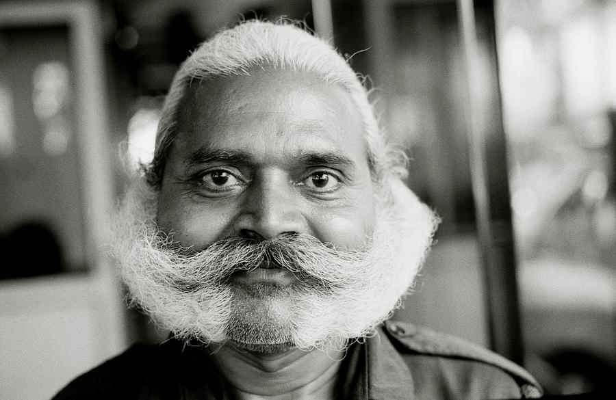 A Mumbai Man Photograph by Shaun Higson