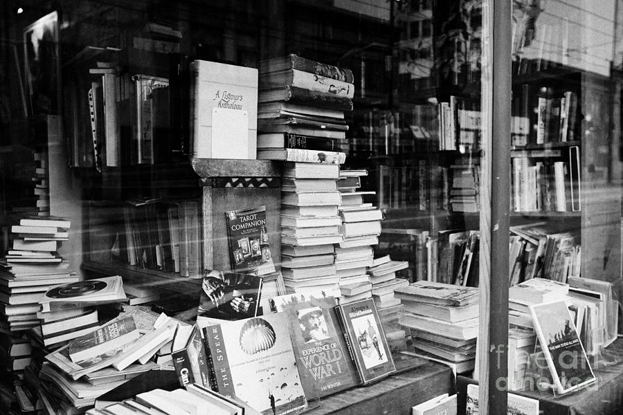 Book Photograph - books in the window of a used book store Vancouver BC Canada by Joe Fox