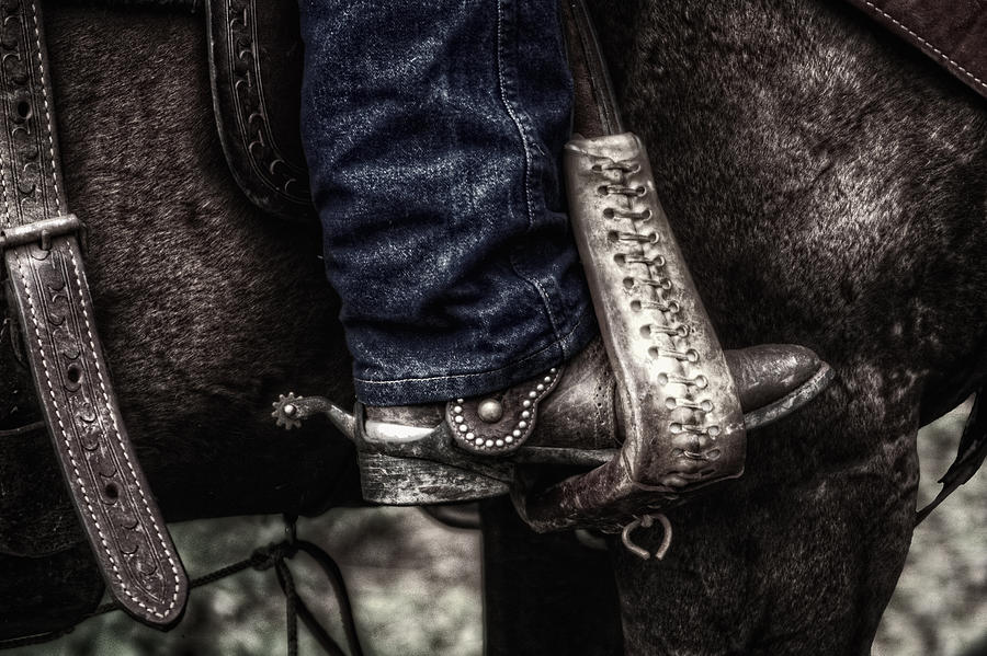 Boot And Saddle And Jeans Photograph