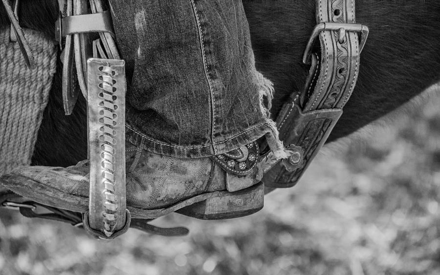 Boots and stirrup Photograph by David Jeffries - Fine Art America